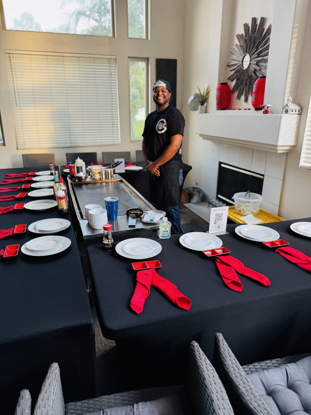 At-home hibachi table setup with red napkins