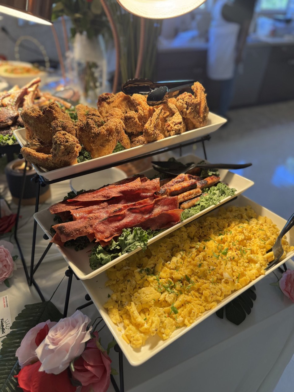 Tiered brunch display with wings, bacon and eggs