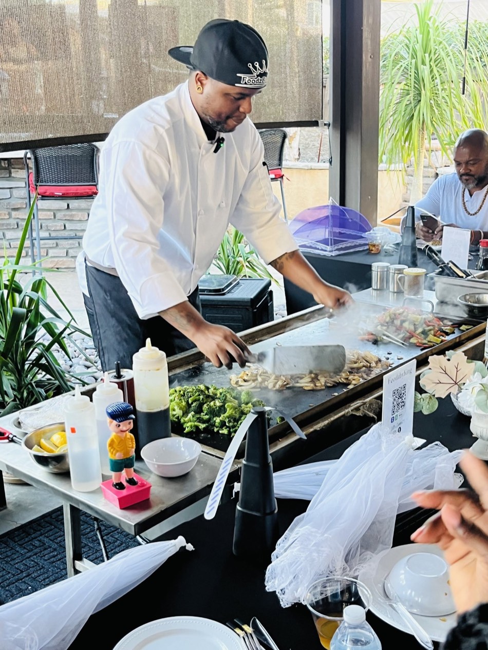 Chef Mike King cooking on the hibachi griddle